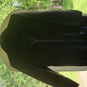 Never worn, very soft,  genuine Coach black leather jacket